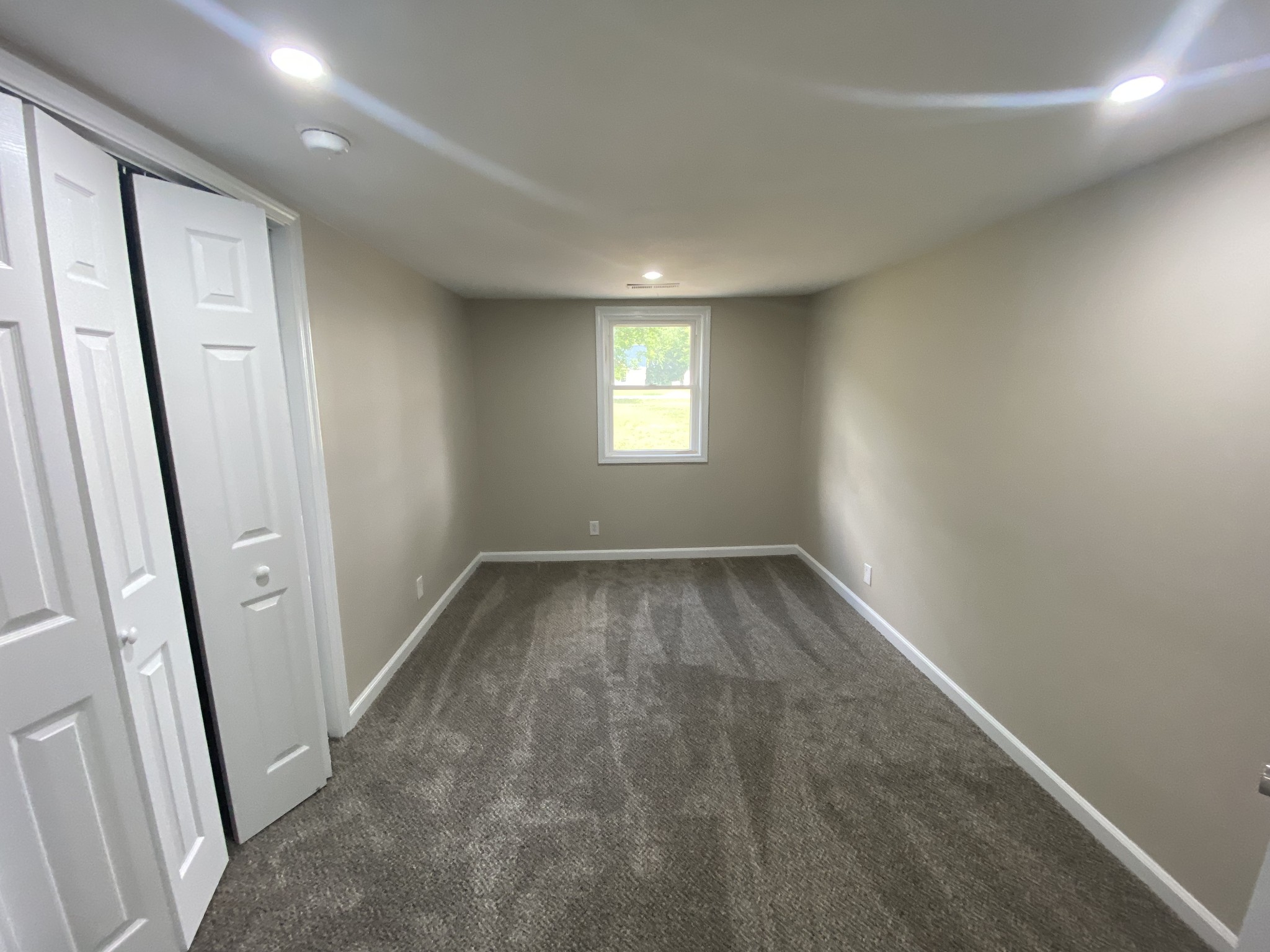 4908 Marion Road Cunningham, TN 37052 - Photo 24 of 27 an empty room with windows