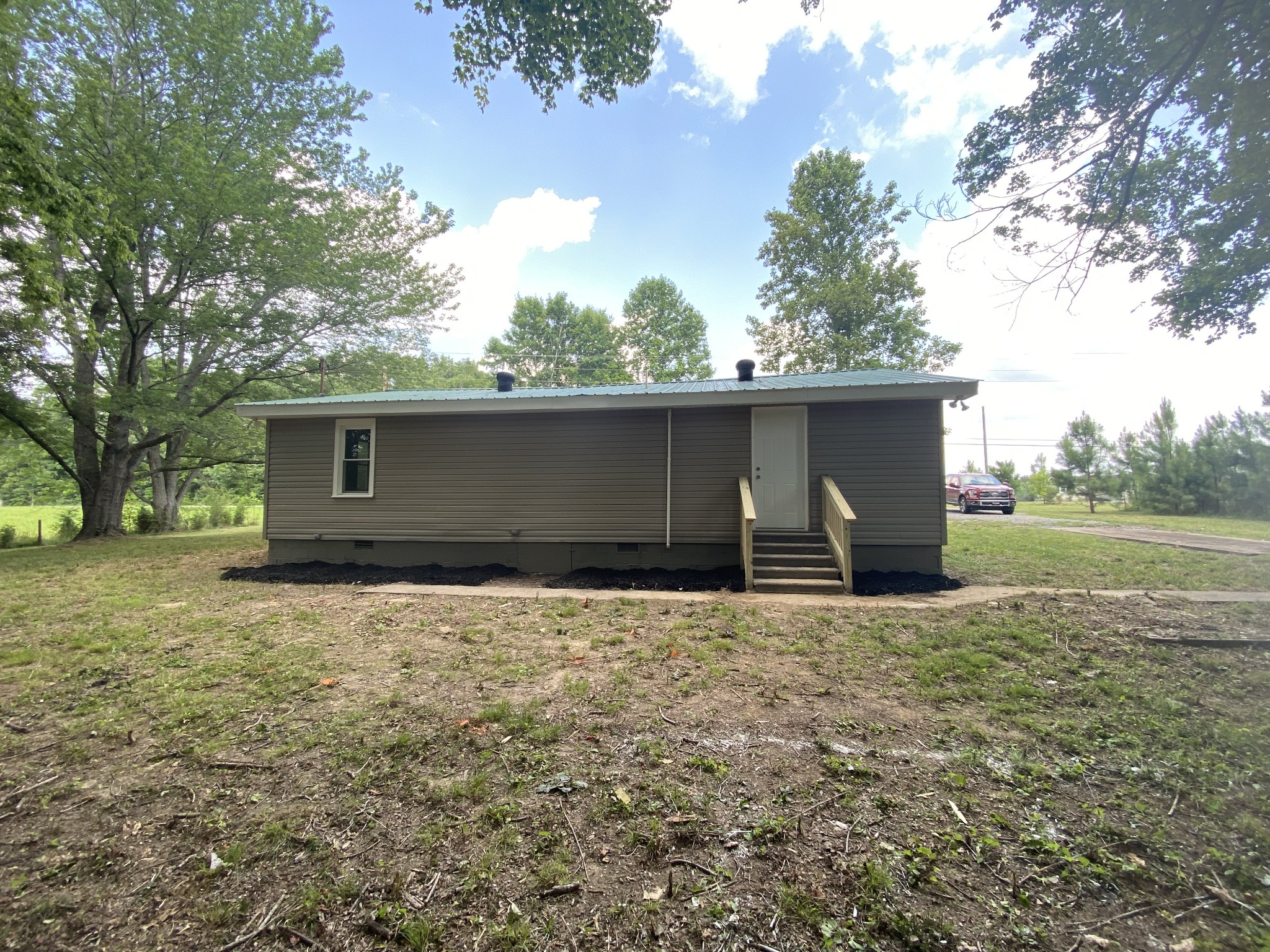 4908 Marion Road Cunningham, TN 37052 - Photo 4 of 27 a view of house with yard