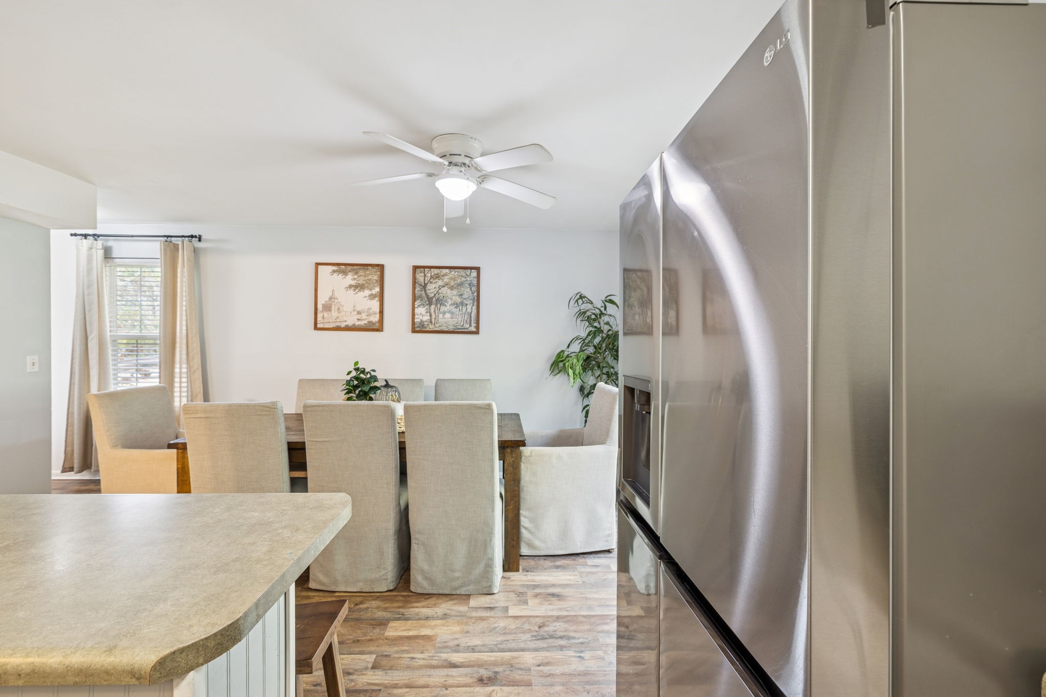110 Bellevue Road, Unit 12 Nashville, TN 37221 - Photo 12 of 25 a view of a dining room with furniture and a chandelier