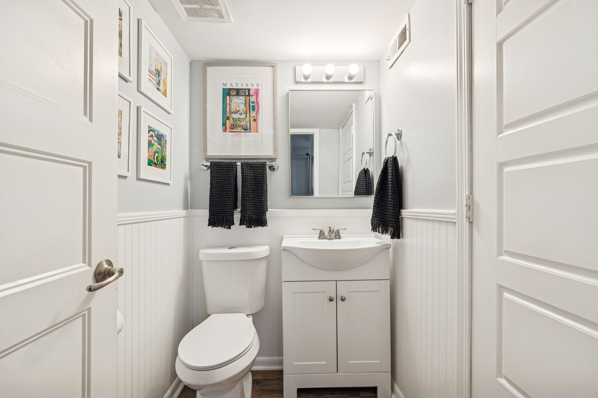 110 Bellevue Road, Unit 12 Nashville, TN 37221 - Photo 14 of 25 a bathroom with a toilet sink and mirror