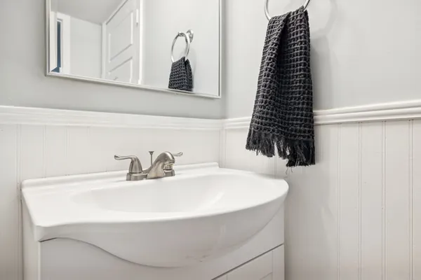 a bathroom with a sink and a bathtub