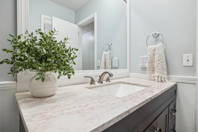 a close view of sink and mirror