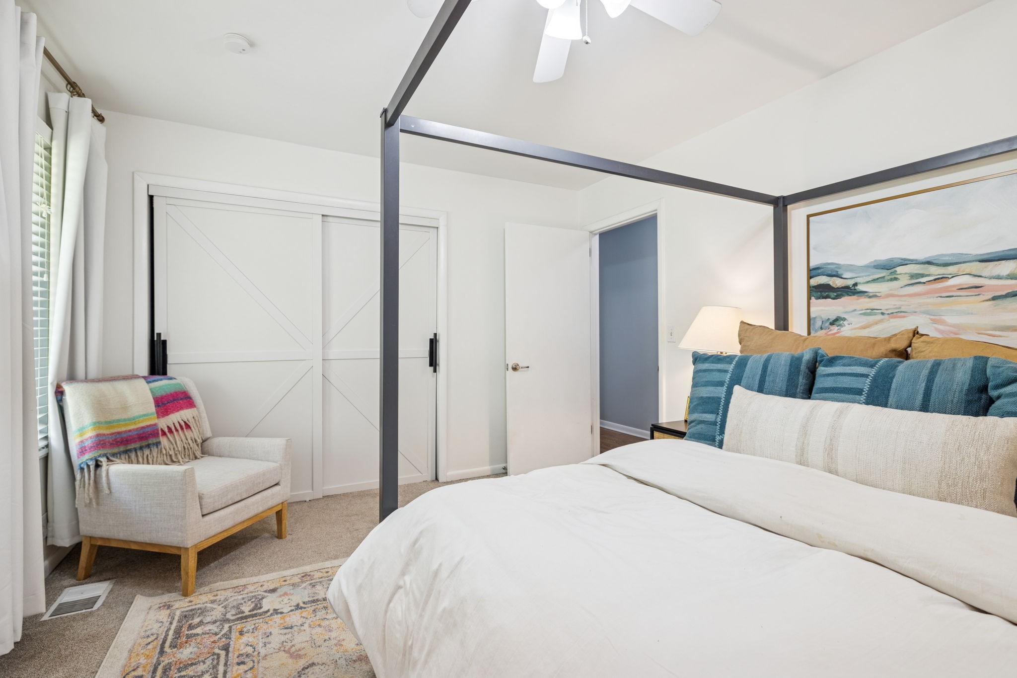 110 Bellevue Road, Unit 12 Nashville, TN 37221 - Photo 21 of 25 a bedroom with a bed and a couch