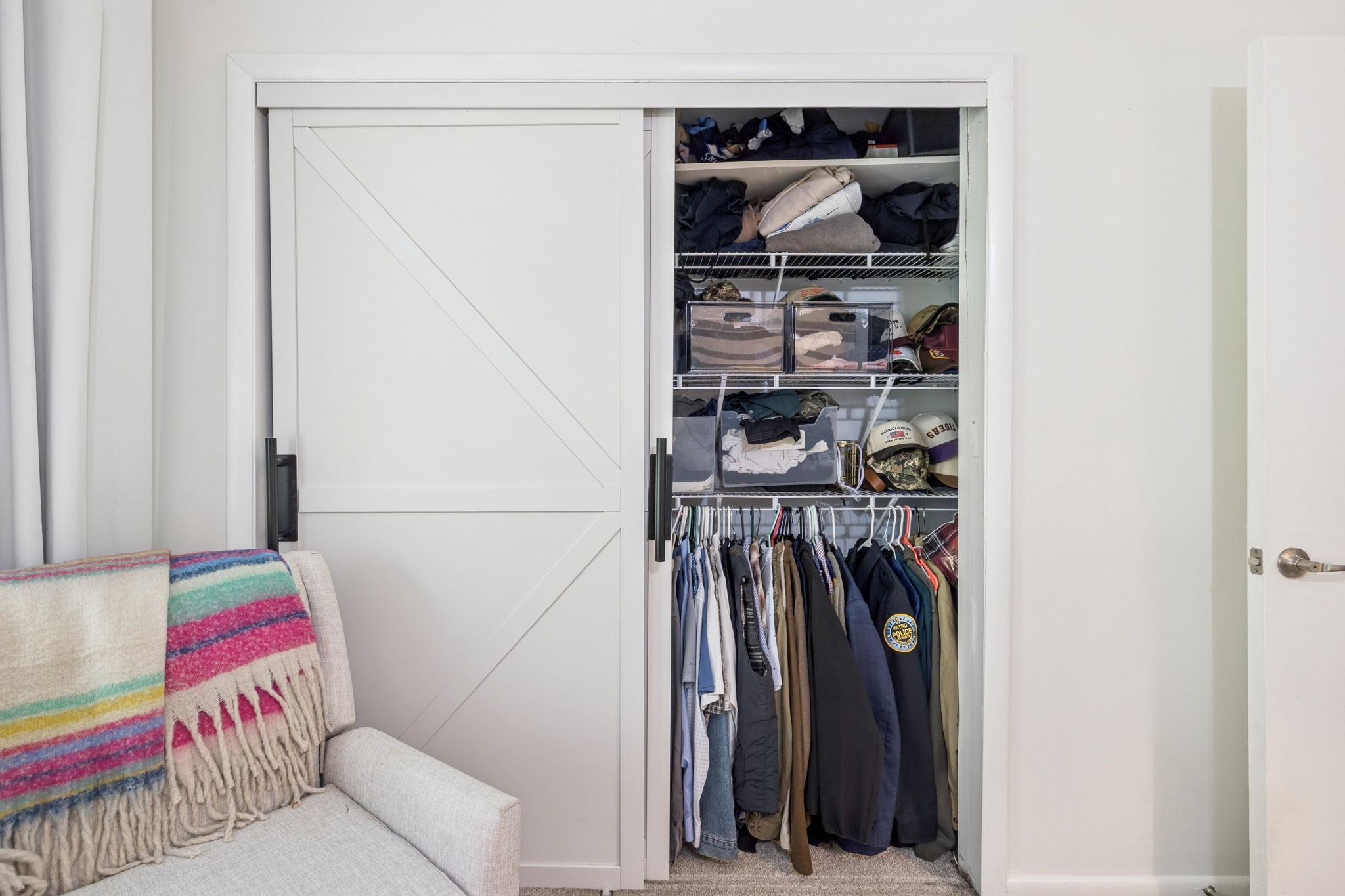 110 Bellevue Road, Unit 12 Nashville, TN 37221 - Photo 22 of 25 a view of walk in closet with clothes and shoes