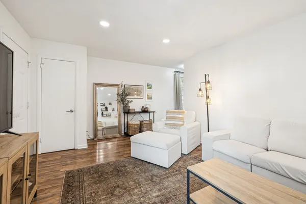a living room with furniture and a table