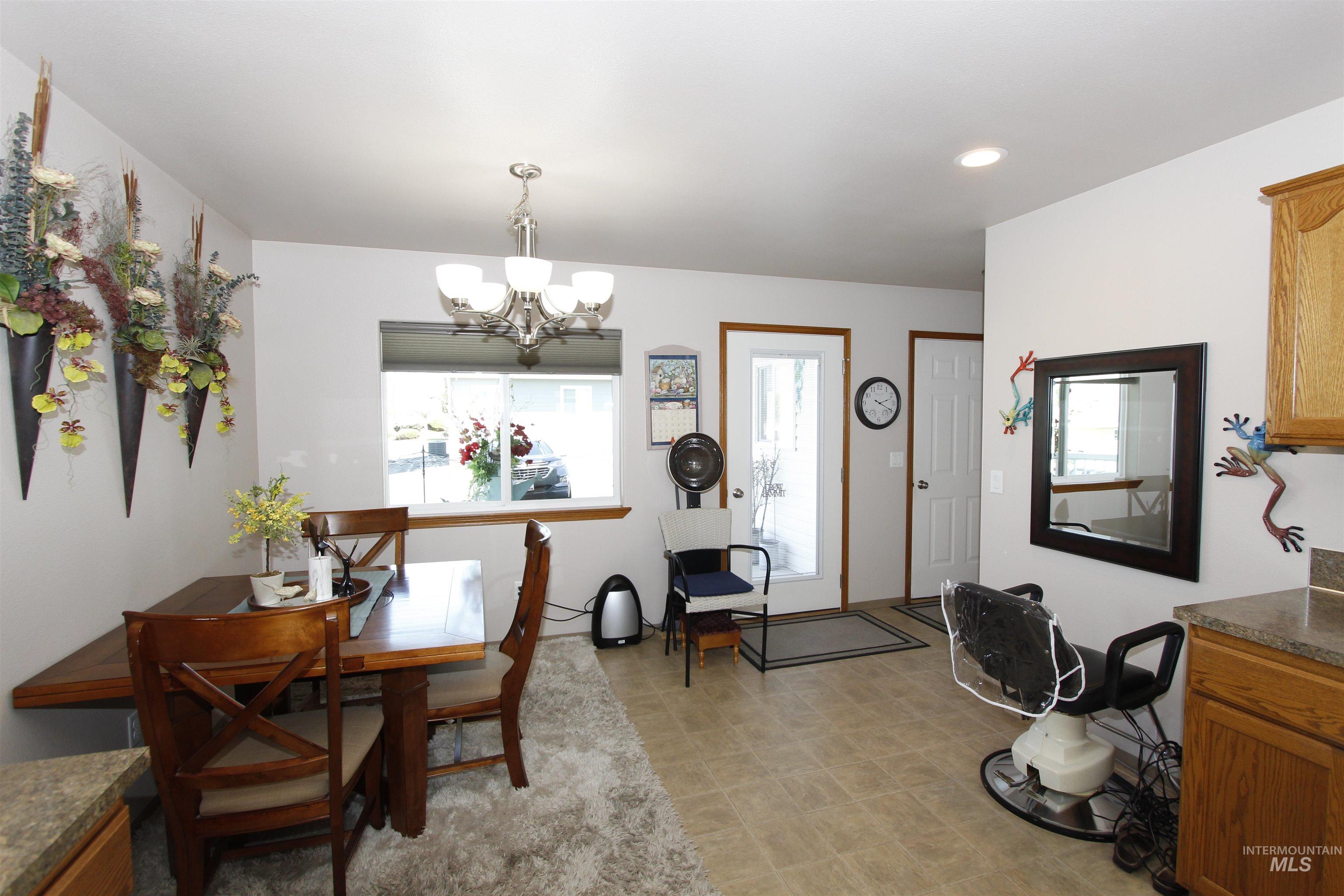 1803 16th Street Lewiston, ID 83501 - Photo 12 of 22 Open-concept room featuring neutral paint, recessed lighting, and tile flooring