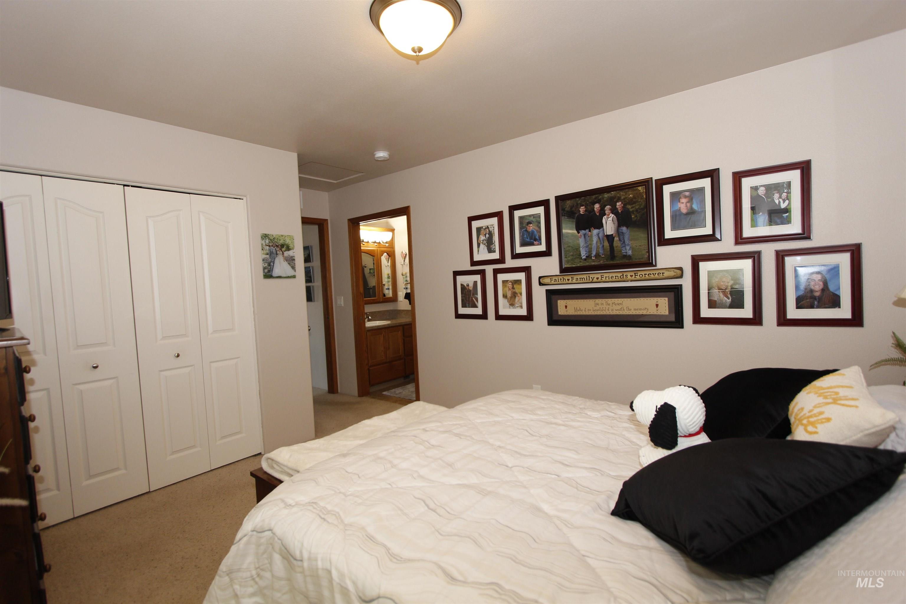 1803 16th Street Lewiston, ID 83501 - Photo 14 of 22 Spacious room featuring neutral carpeting, light-toned walls, and a ceiling-mounted light fixture