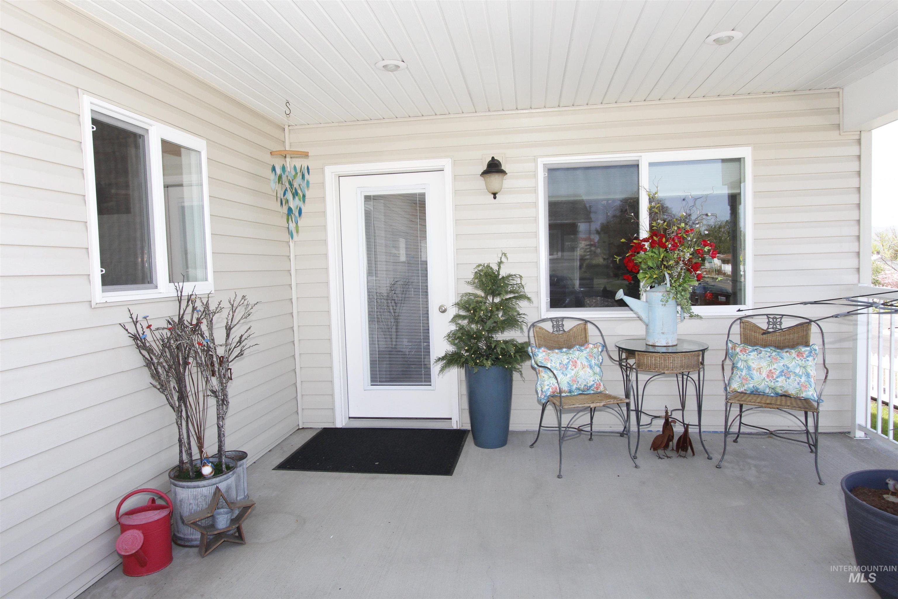 1803 16th Street Lewiston, ID 83501 - Photo 19 of 22 Covered front porch featuring light-colored siding