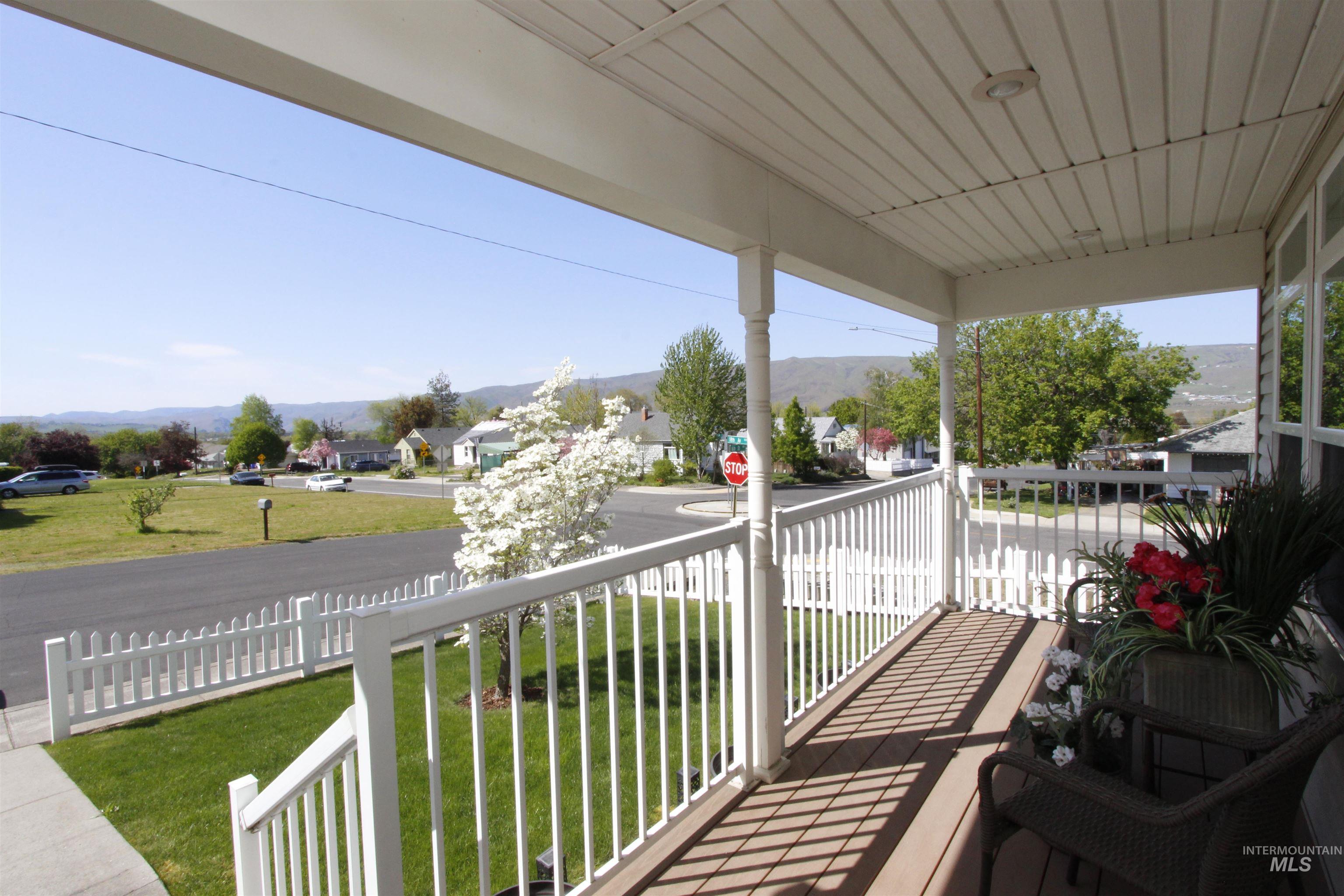 1803 16th Street Lewiston, ID 83501 - Photo 4 of 22 Inviting covered porch with composite decking and white spindle railing