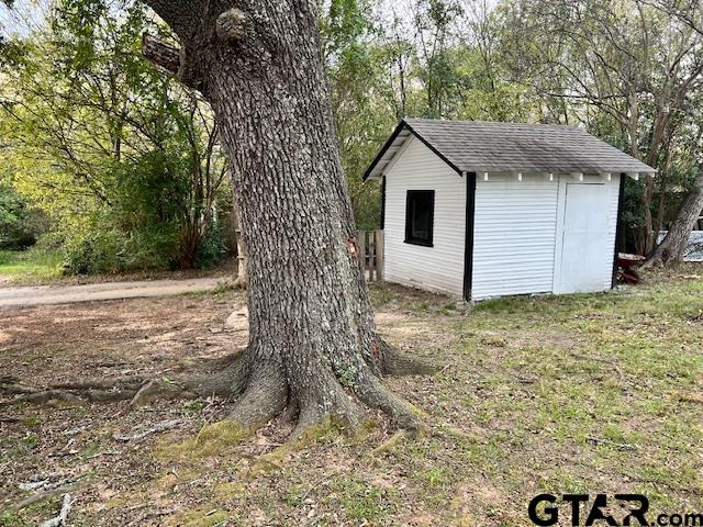 460 Pine Street Frankston, TX 75763 - Photo 12 of 13 a view of a house with a yard