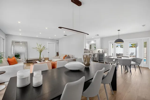 a bedroom with two beds and a window