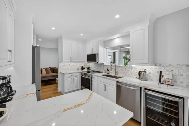 an aerial view of a house with a garden