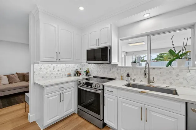 an aerial view of a city with lots of residential buildings