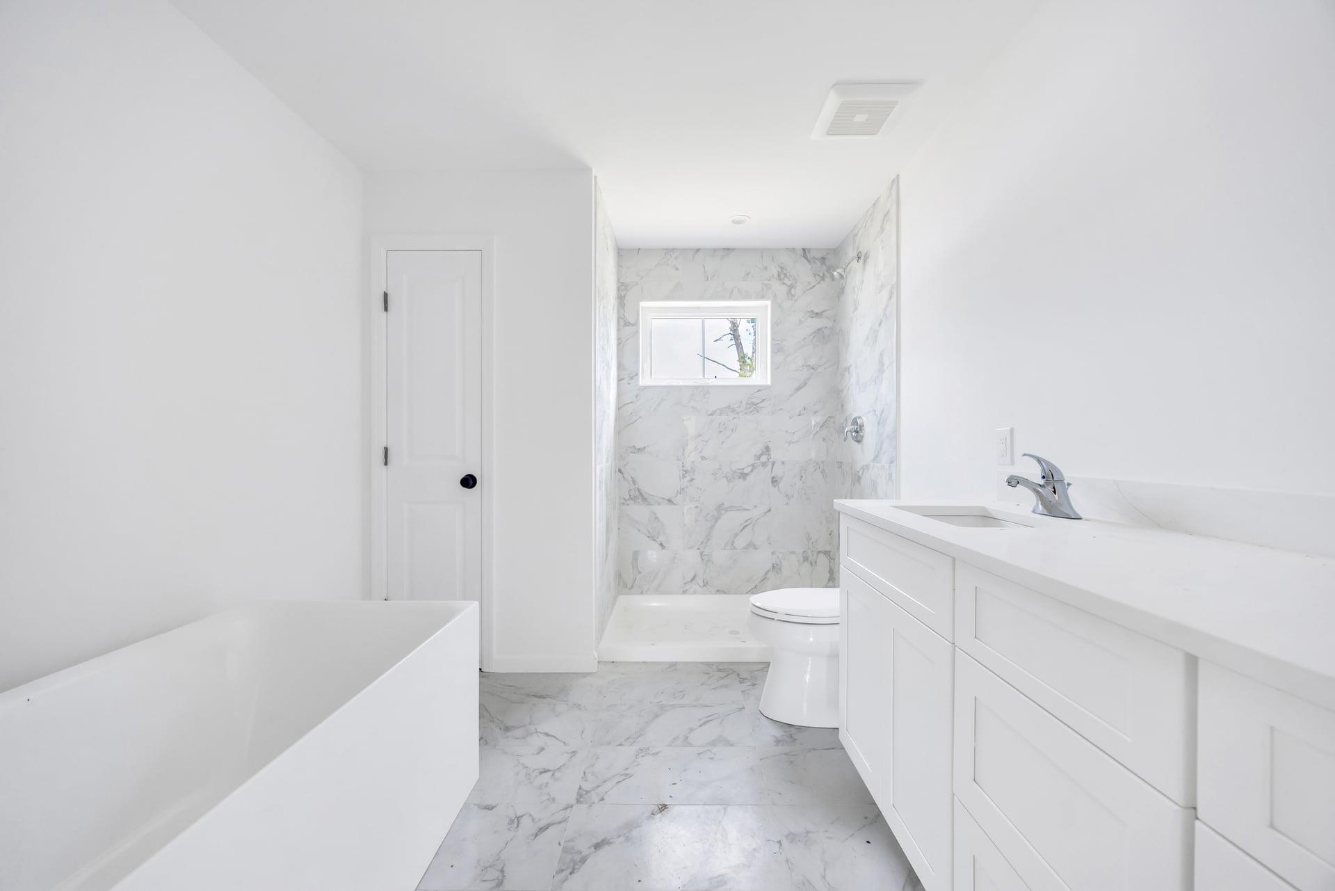 Lot #3 Cardinal Court Ridge, NY 11961 - Photo 28 of 31 a bathroom with a sink a toilet and shower