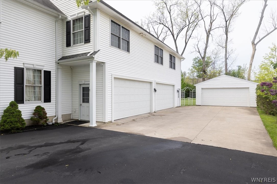 860 Union Road West Seneca, NY 14224 - Photo 46 of 50 Entrances to Heated Garages for up to Seven Cars/