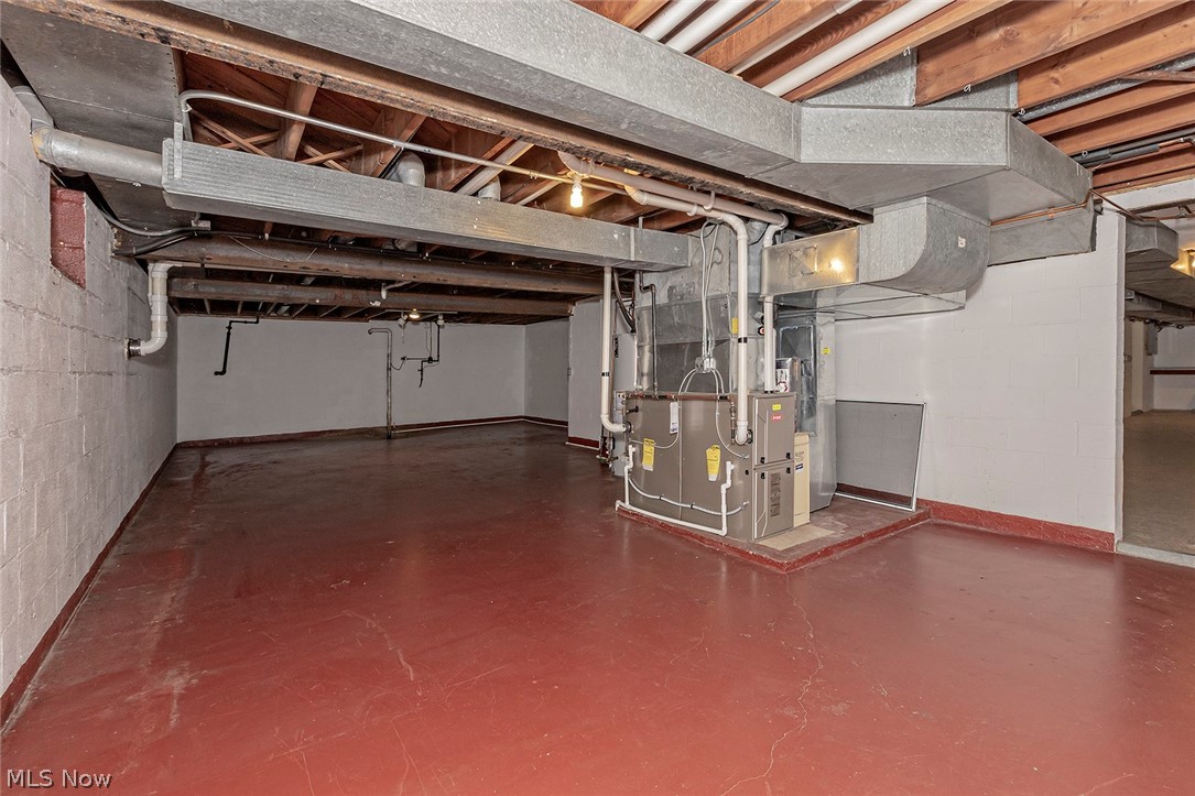 28430 Edgedale Road Pepper Pike, OH 44124 - Photo 25 of 35 .... lower level goes on... and on... and on and is home to the two furnaces and newer hot water tank.