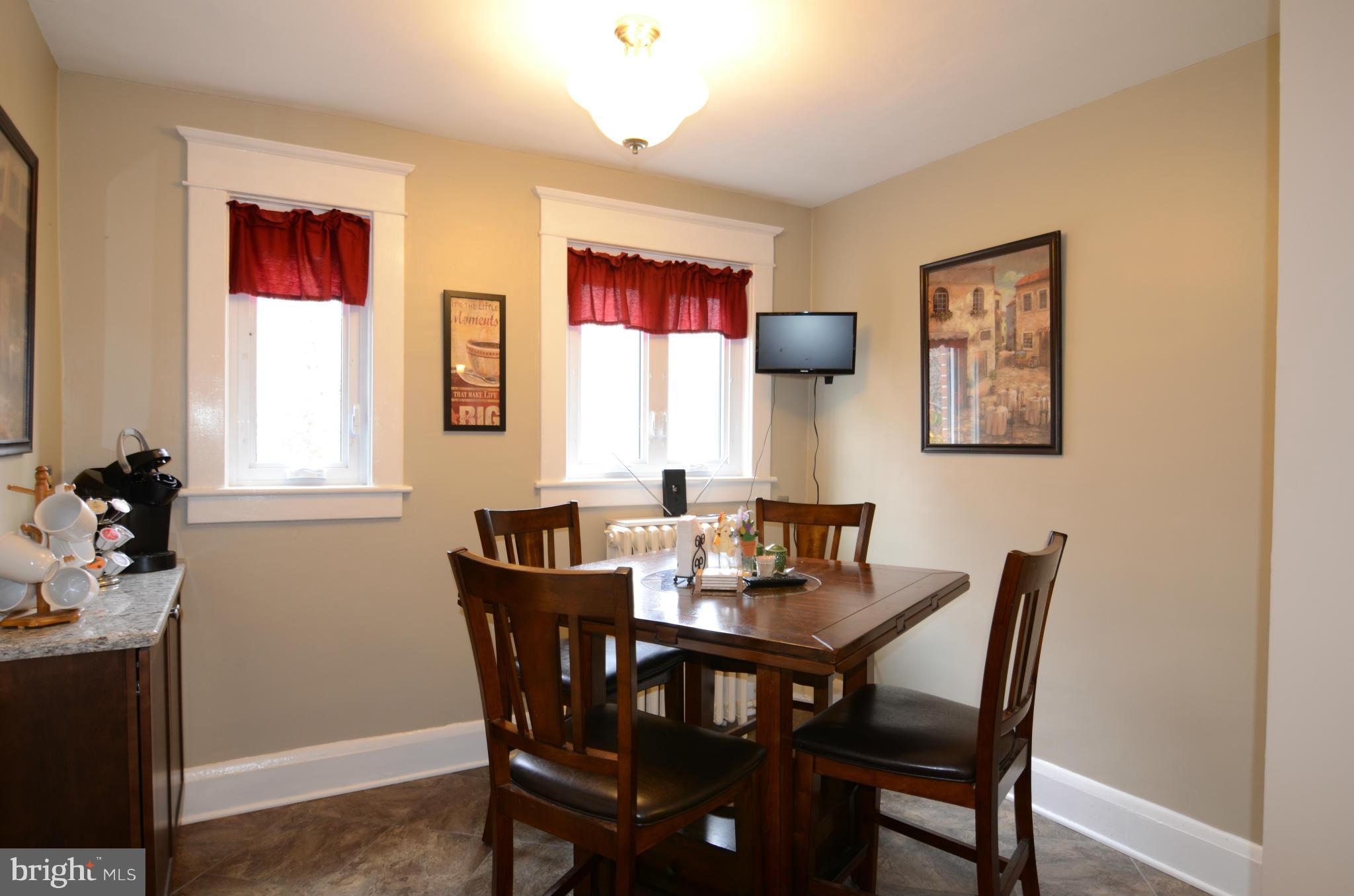 4425 Wickford Road Baltimore, MD 21210 - Photo 11 of 28 a view of a dining room with furniture and window
