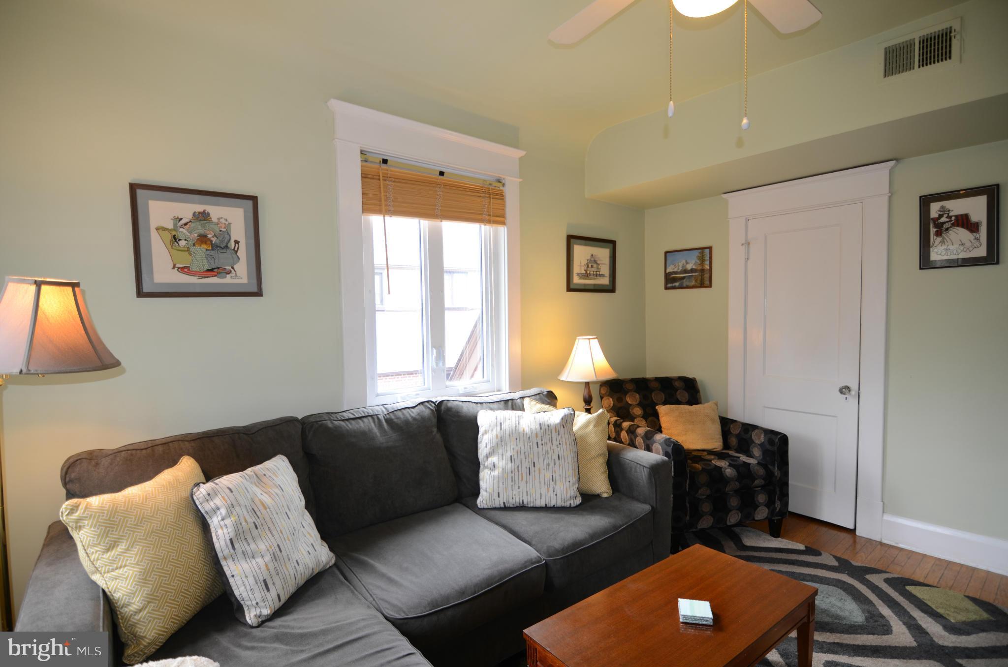 4425 Wickford Road Baltimore, MD 21210 - Photo 16 of 28 a living room with furniture and a window