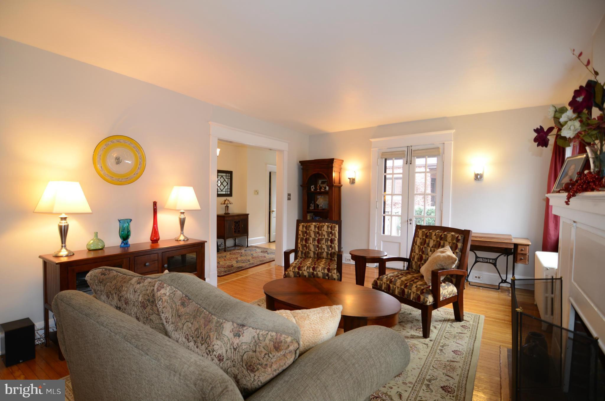 4425 Wickford Road Baltimore, MD 21210 - Photo 4 of 28 a living room with furniture kitchen view and a large window