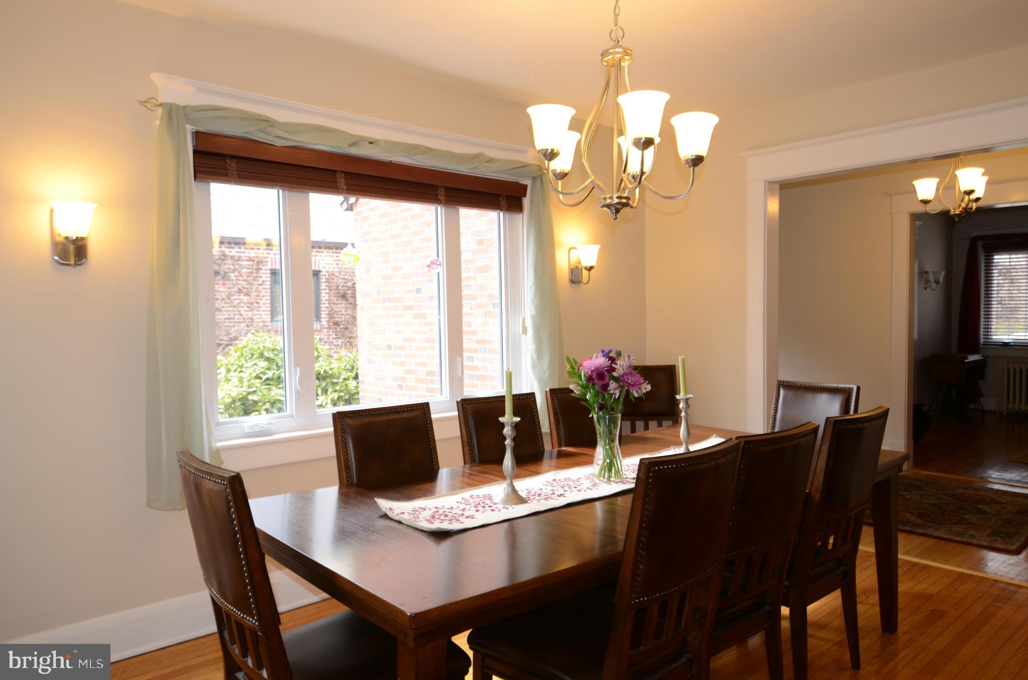 4425 Wickford Road Baltimore, MD 21210 - Photo 5 of 28 a view of a dining room with furniture window and wooden floor