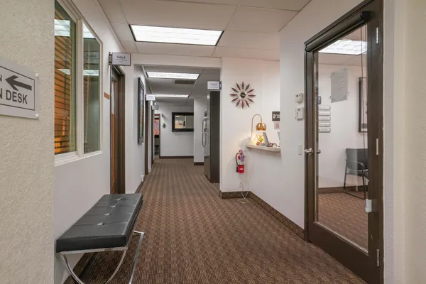 a view of a tables and chairs in a room