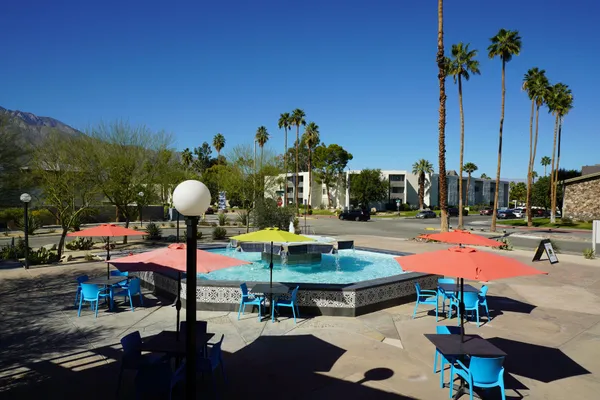 a view of a chairs and tables in patio