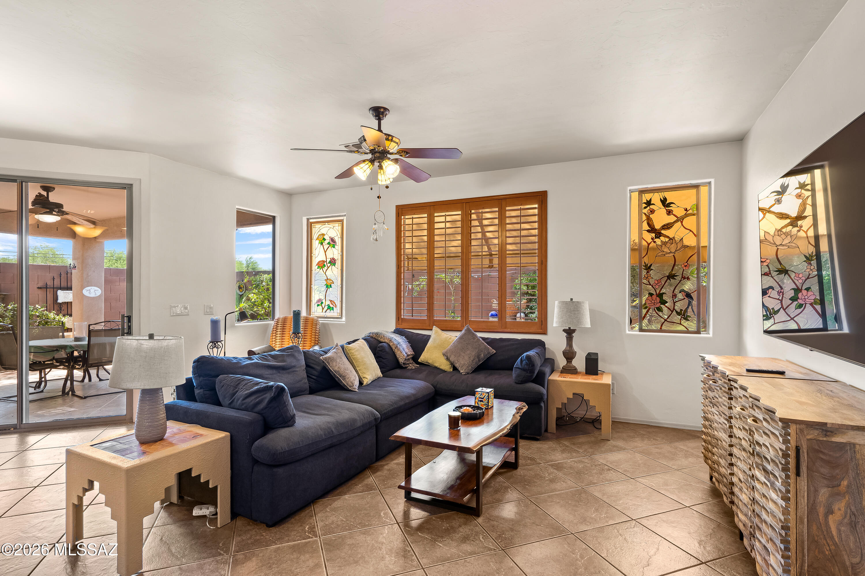 3396 North Camino Rio Colorado Tucson, AZ 85712 - Photo 12 of 32 a living room with furniture and a large window