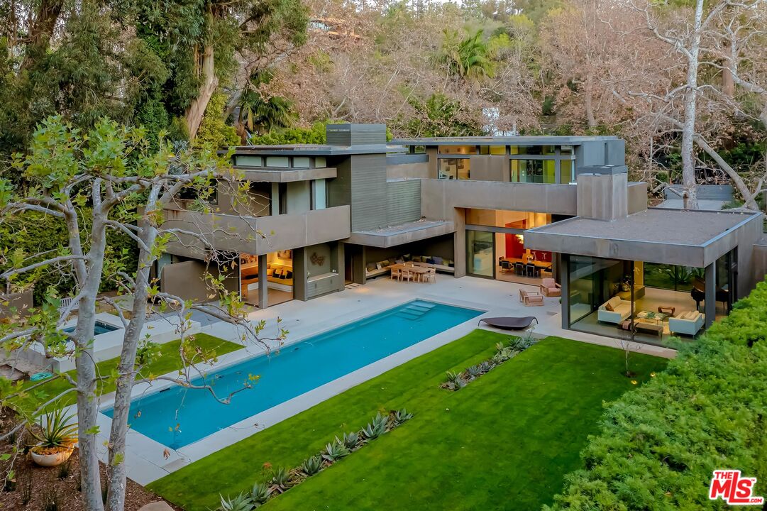 671 Latimer Road Santa Monica, CA 90402 - Photo 1 of 27 an aerial view of a house with swimming pool and porch