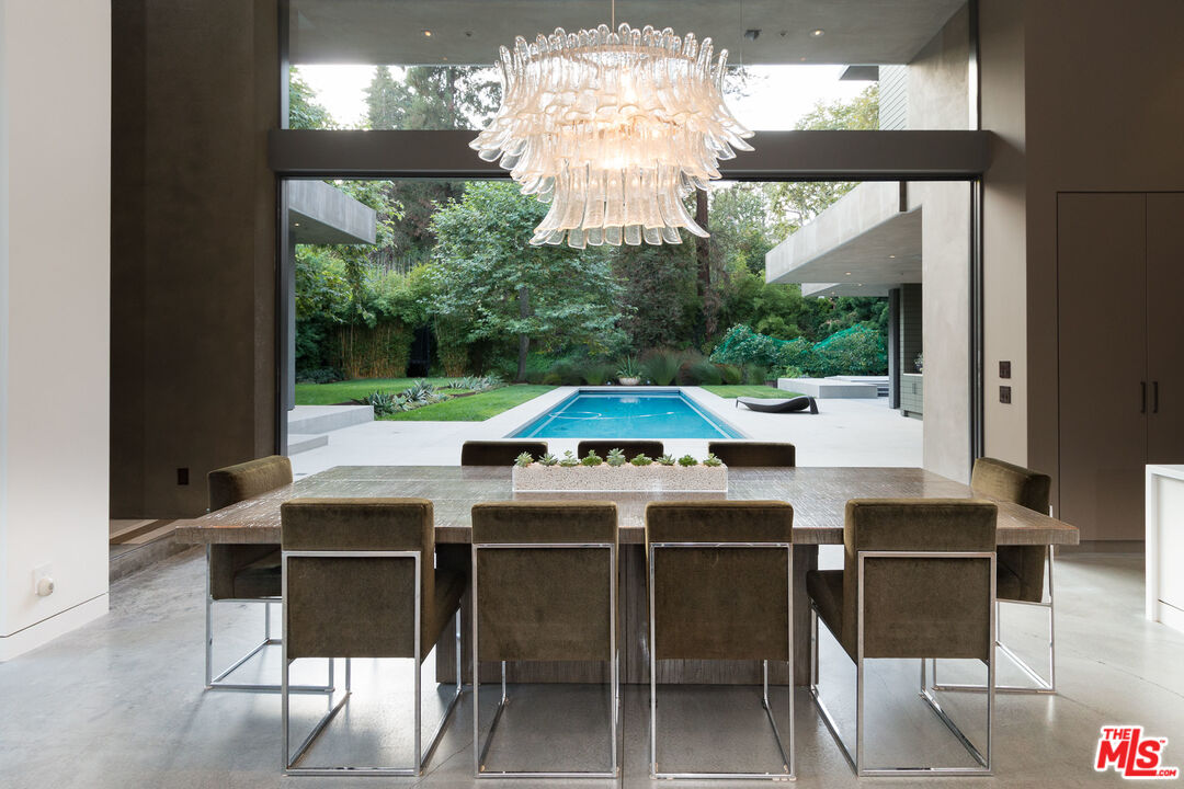 671 Latimer Road Santa Monica, CA 90402 - Photo 14 of 27 a table and chairs in the balcony