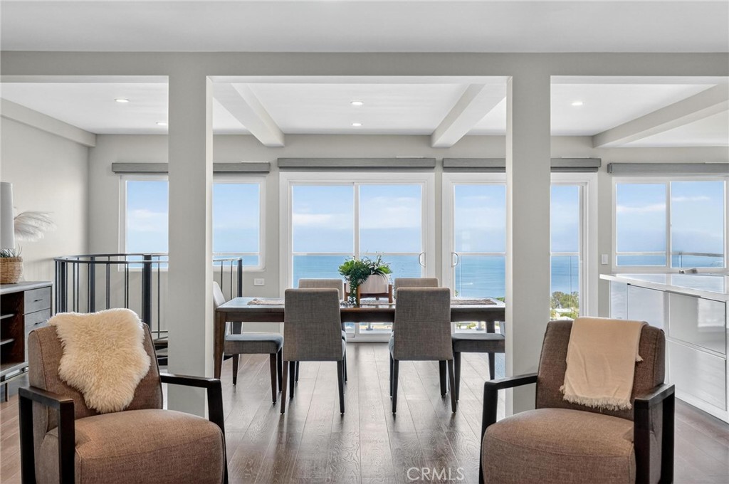 865 Quivera Street Laguna Beach, CA 92651 - Photo 4 of 23 a view of a dining room with furniture and wooden floor