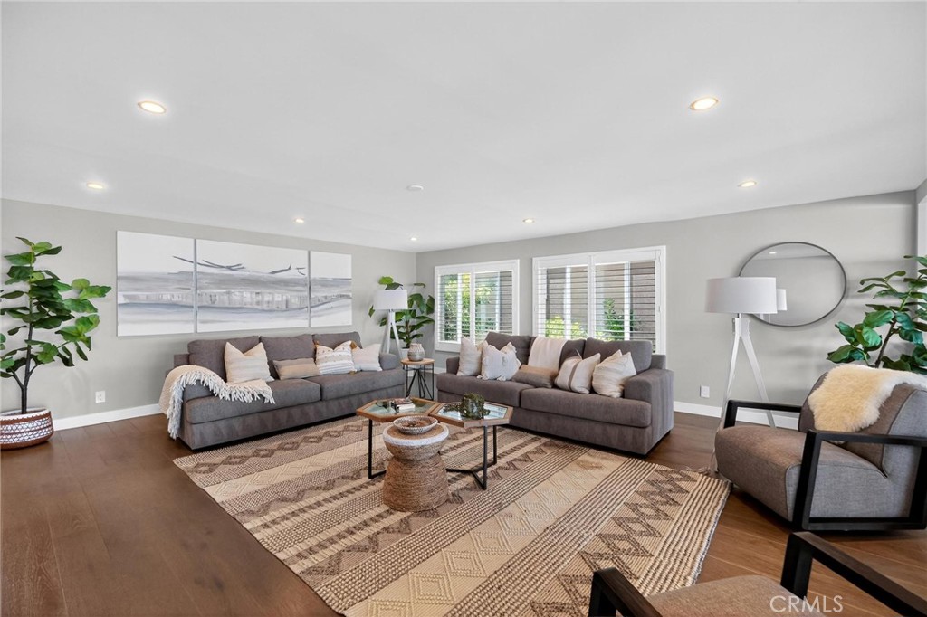 865 Quivera Street Laguna Beach, CA 92651 - Photo 6 of 23 a living room with furniture and a large window