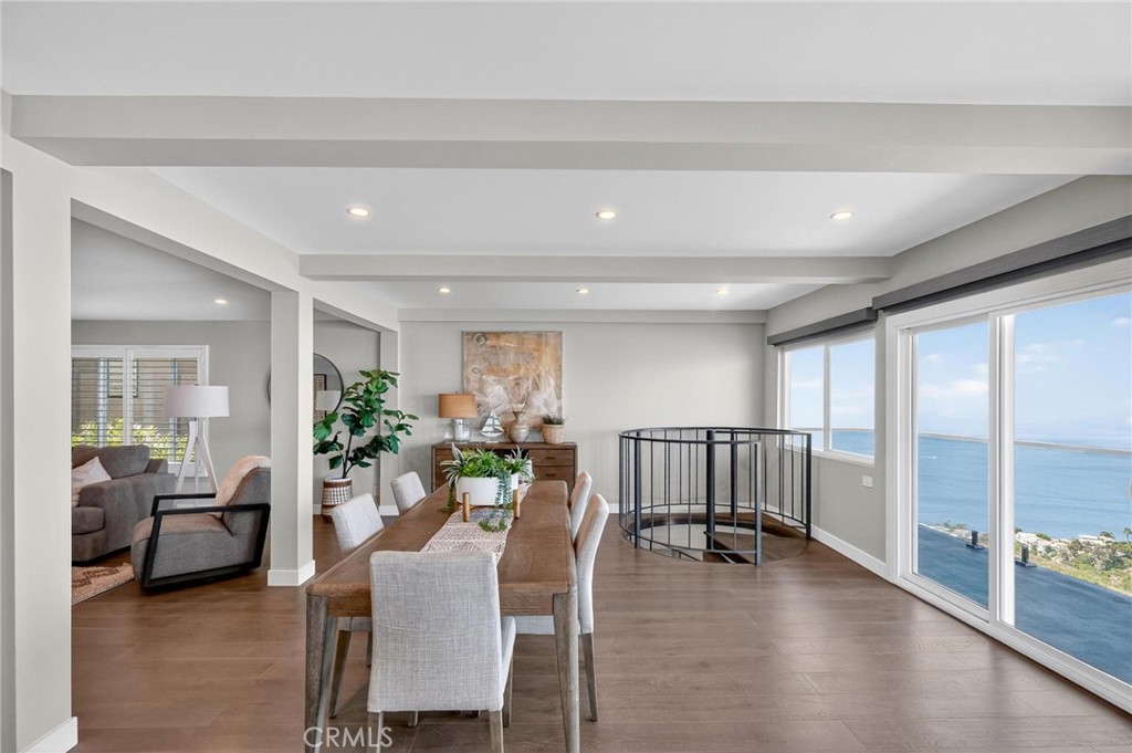 865 Quivera Street Laguna Beach, CA 92651 - Photo 10 of 23 a living room with furniture and a wooden floor