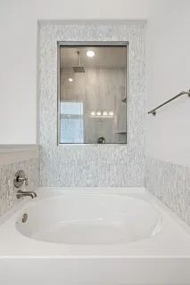 a bathroom with bathtub