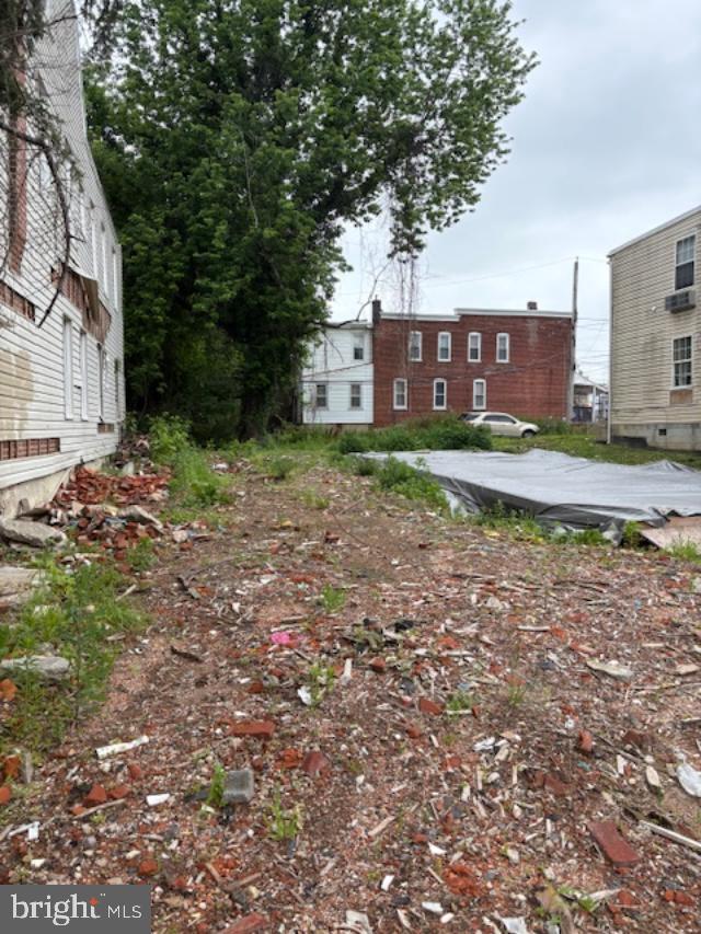 239 West 9th Street Chester, PA 19013 - Photo 1 of 2 a view of a house with a yard