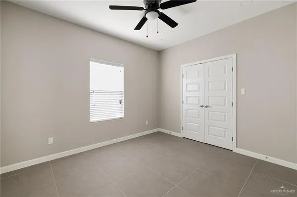 a view of empty room with windows