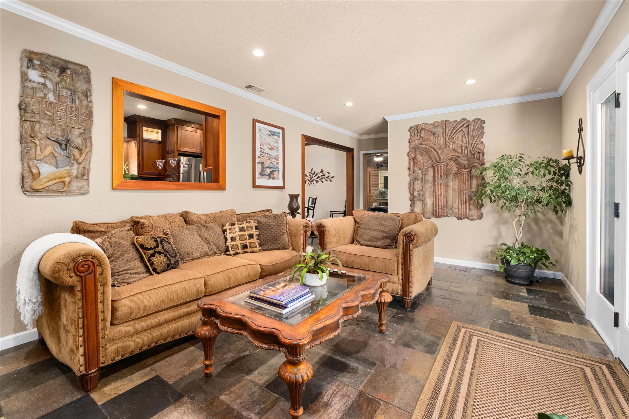2301 Del Curto Road Austin, TX 78704 - Photo 11 of 33 a living room with furniture potted plant and a window
