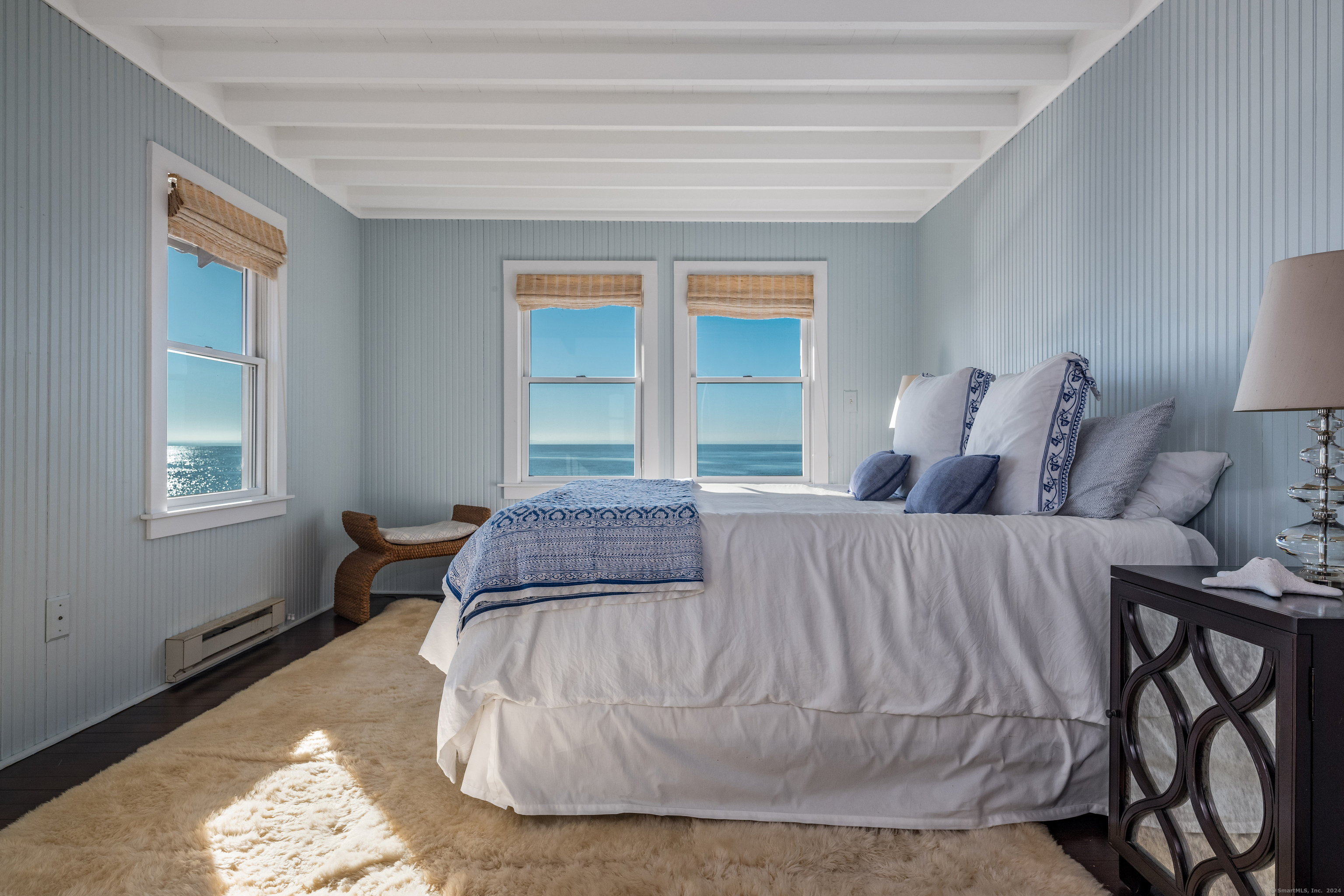 118 Middle Beach Road Madison, CT 06443 - Photo 17 of 28 a bedroom with a bed and a window