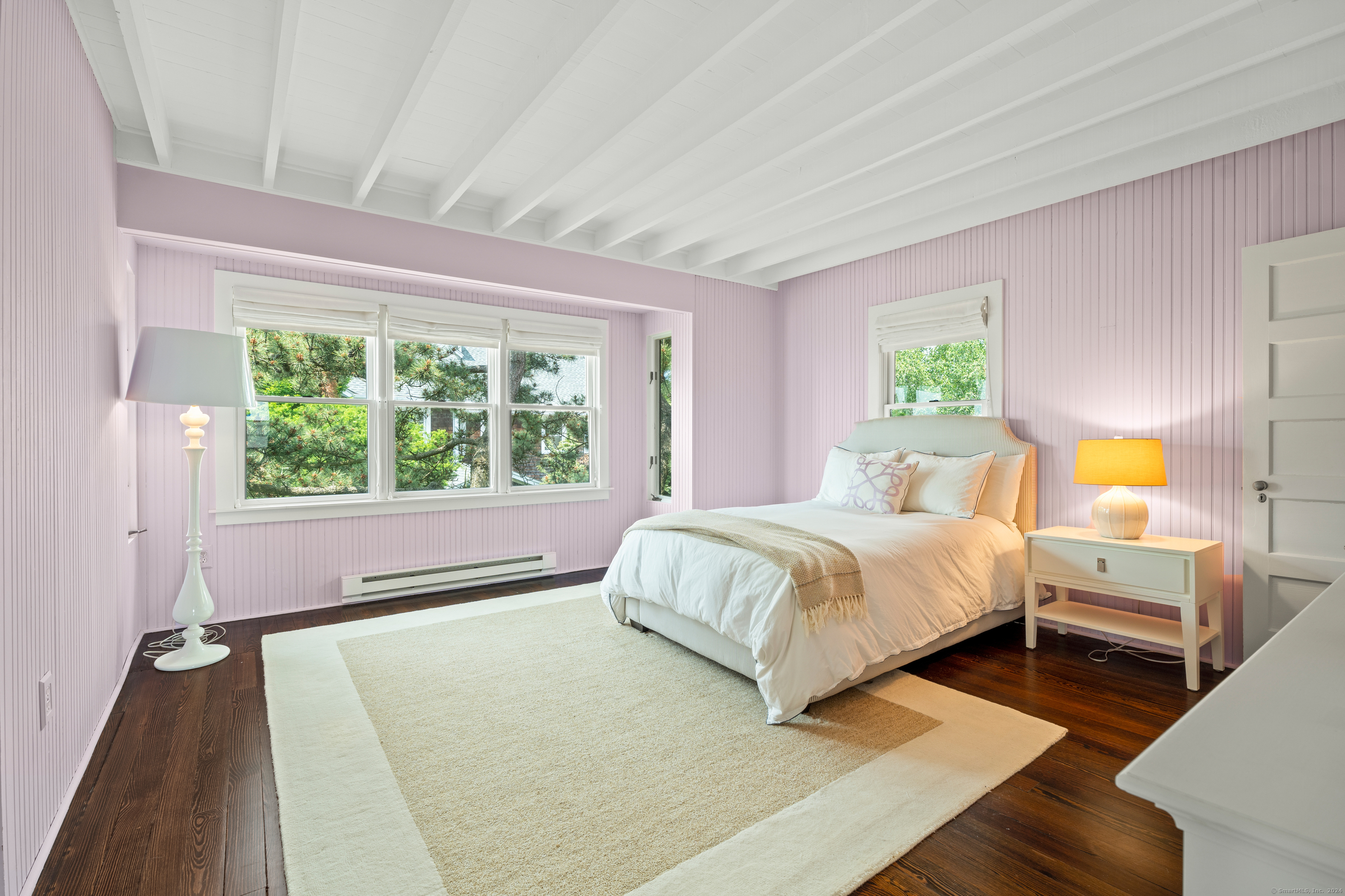 118 Middle Beach Road Madison, CT 06443 - Photo 20 of 28 a bedroom with a large bed and a large window