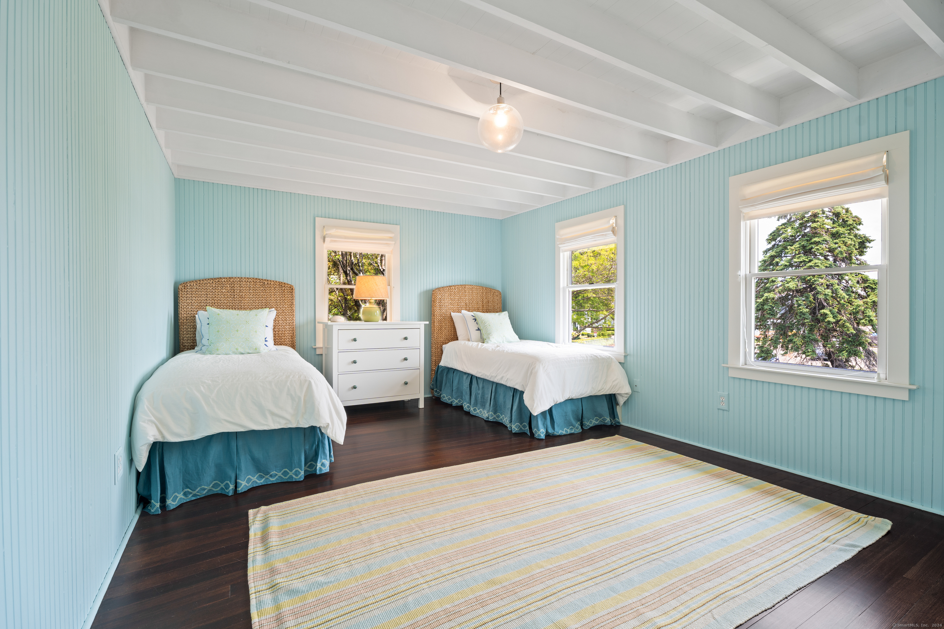 118 Middle Beach Road Madison, CT 06443 - Photo 21 of 28 a bedroom with two beds and wooden floor