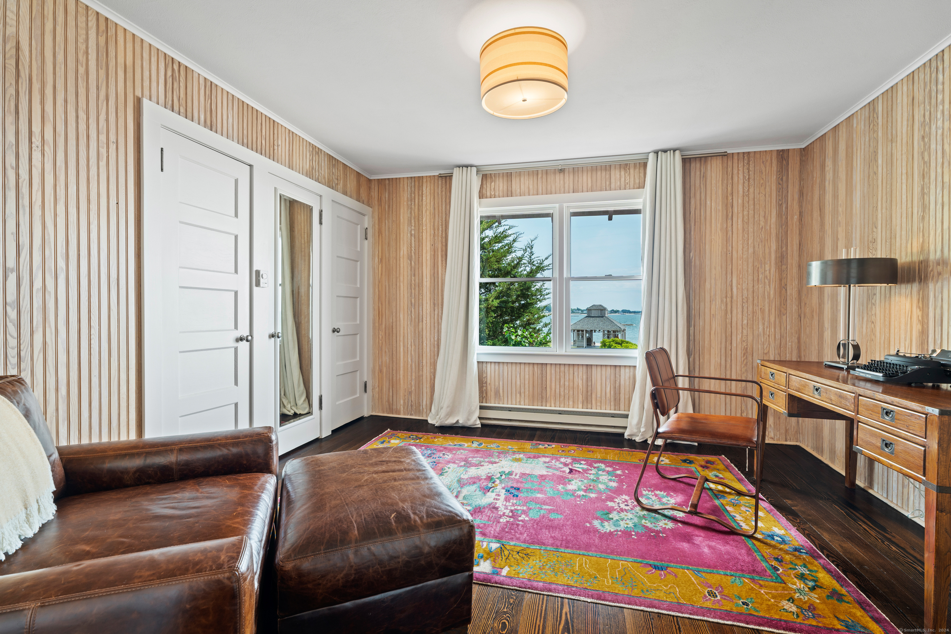 118 Middle Beach Road Madison, CT 06443 - Photo 22 of 28 a bedroom with a bed and a window