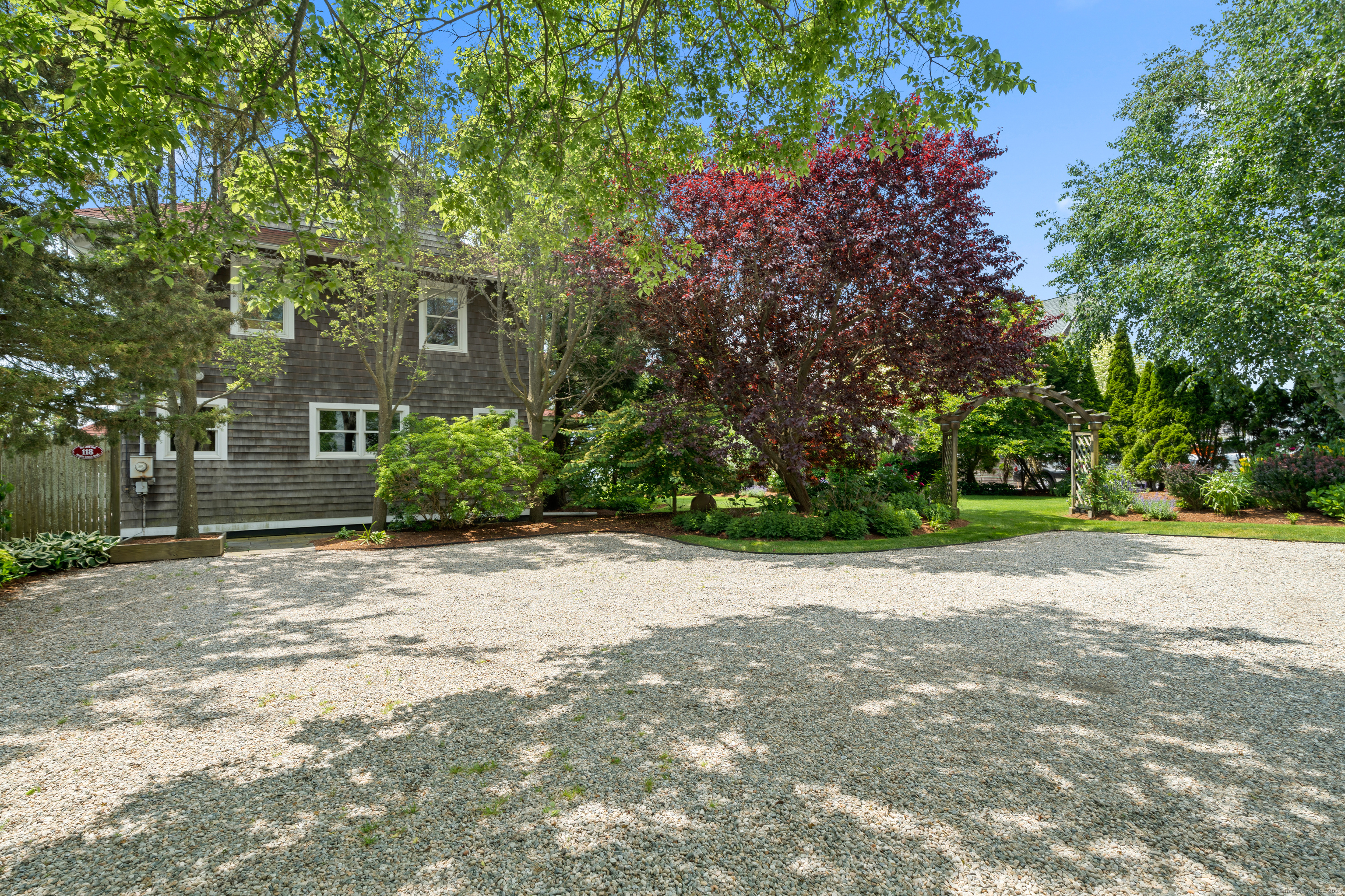 118 Middle Beach Road Madison, CT 06443 - Photo 28 of 28 a view of a house with a street