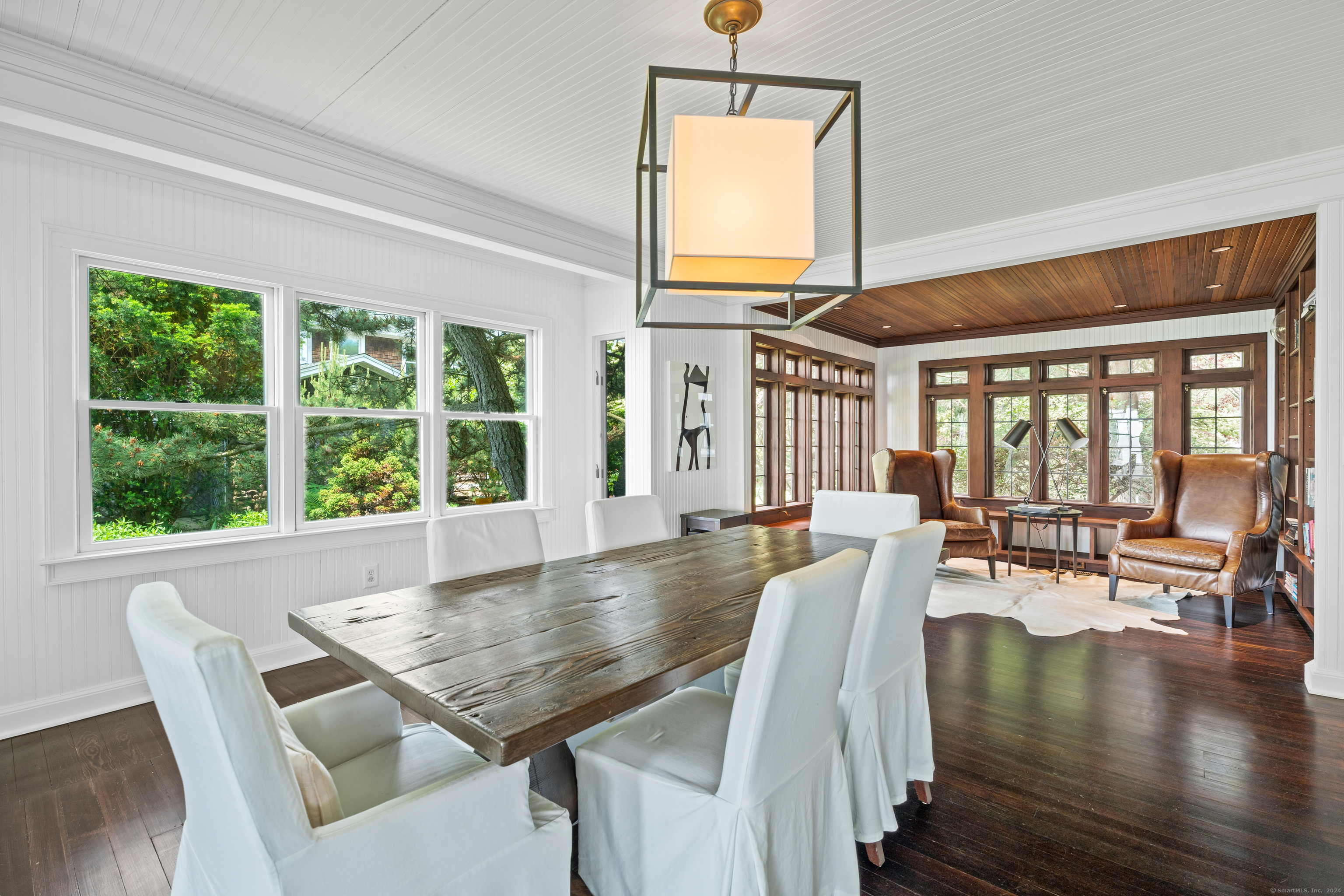 118 Middle Beach Road Madison, CT 06443 - Photo 9 of 28 a view of a dining room with furniture window and wooden floor
