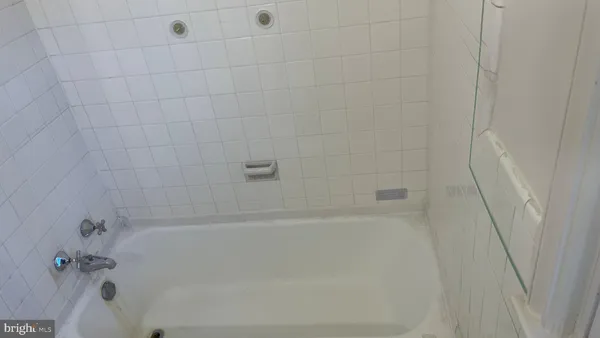 a close up of a bathtub