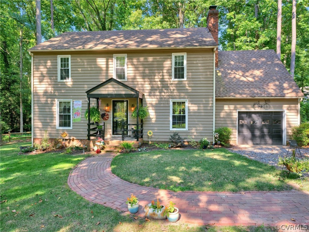 13618 Hunts Bridge Road Midlothian, VA 23112 - Photo 2 of 42 a front view of a house with a yard