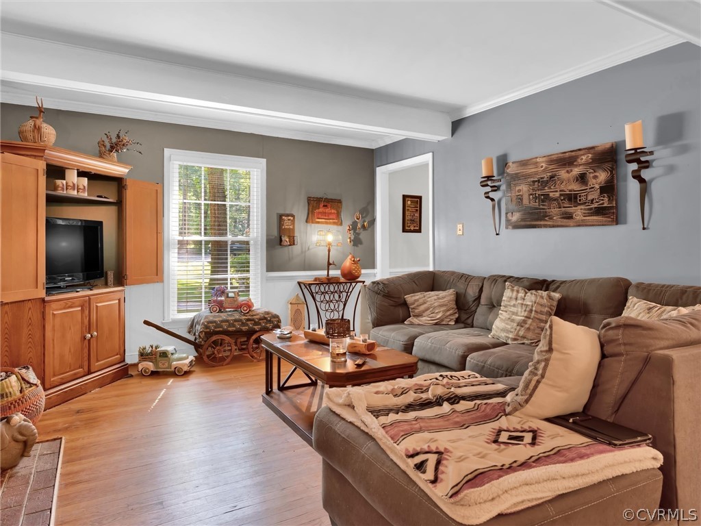 13618 Hunts Bridge Road Midlothian, VA 23112 - Photo 25 of 42 a living room with furniture and a flat screen tv