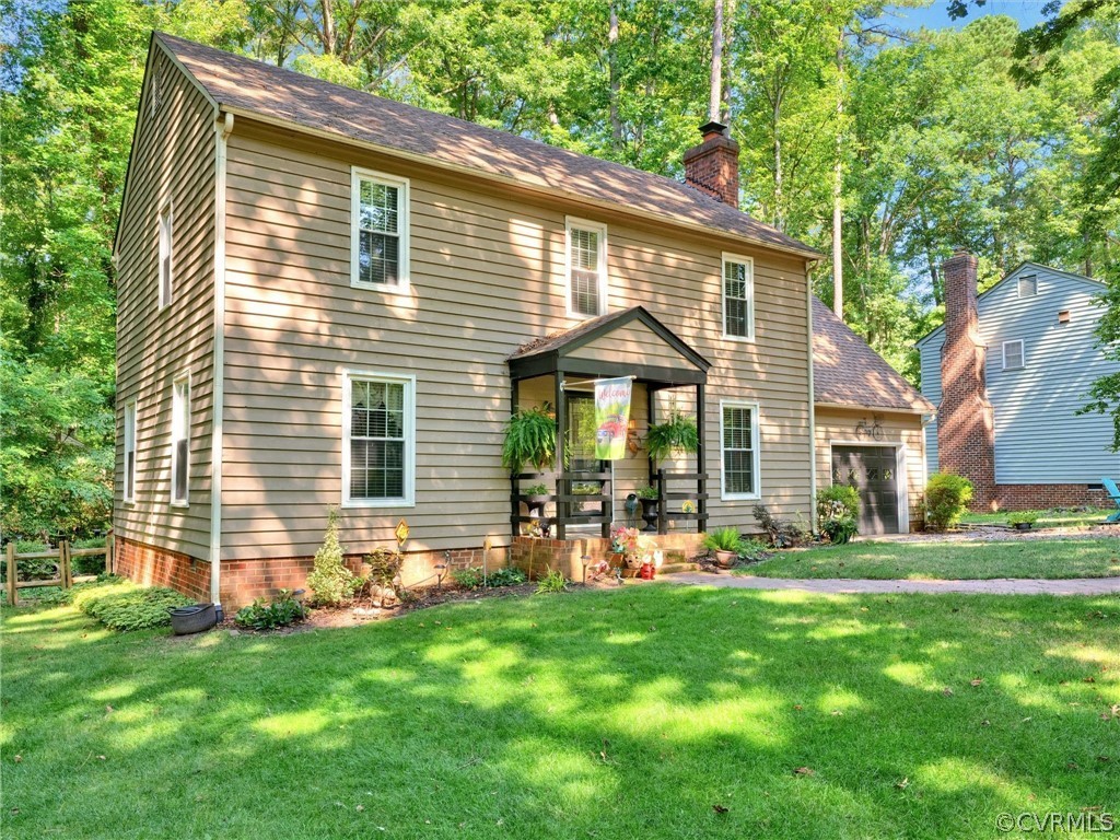 13618 Hunts Bridge Road Midlothian, VA 23112 - Photo 3 of 42 a front view of house with yard and outdoor seating