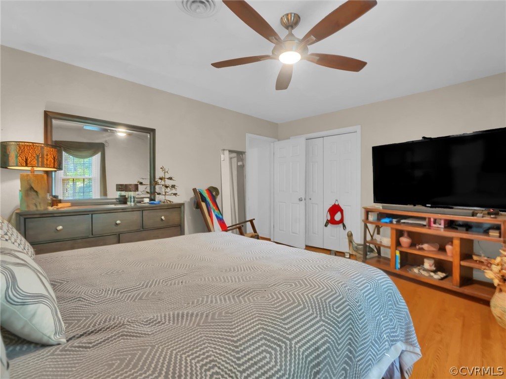 13618 Hunts Bridge Road Midlothian, VA 23112 - Photo 34 of 42 a bedroom with a bed and a flat screen tv