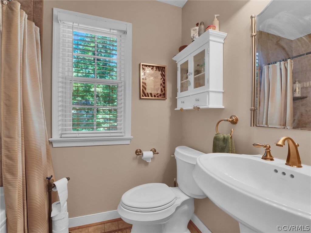 13618 Hunts Bridge Road Midlothian, VA 23112 - Photo 35 of 42 a bathroom with a sink mirror and toilet