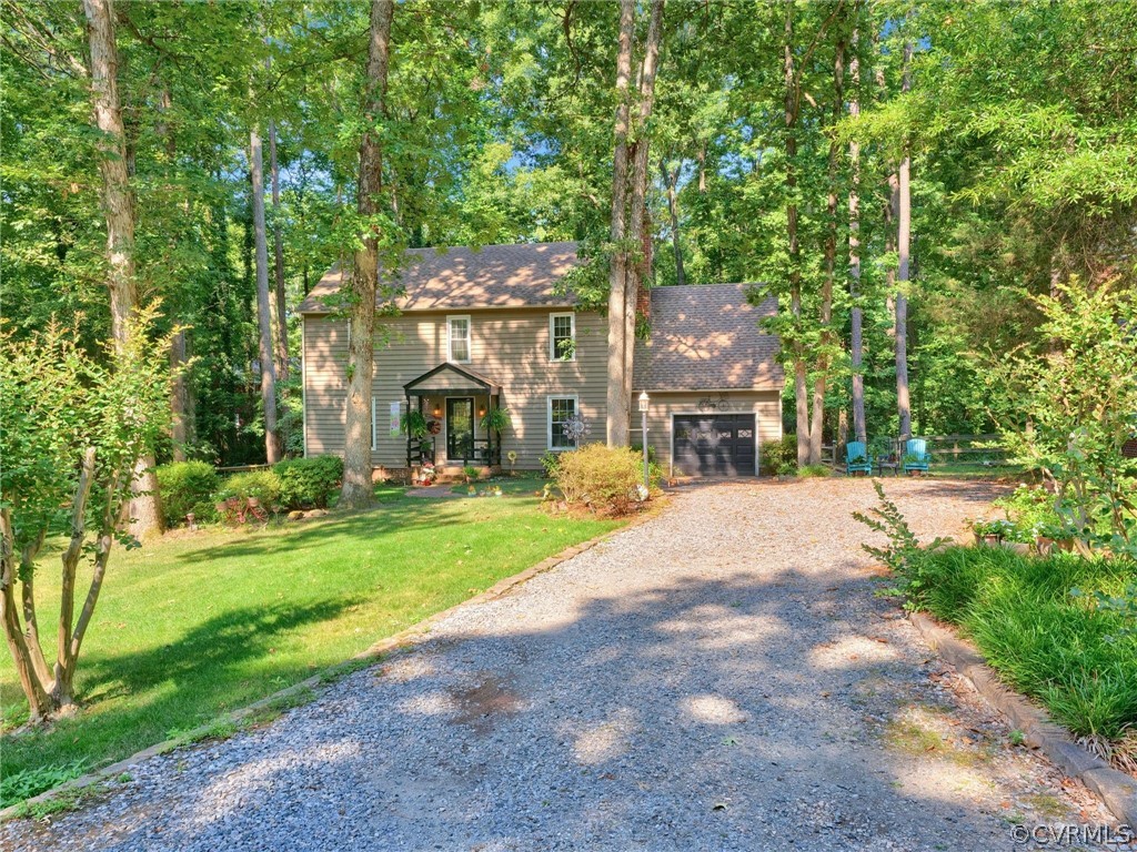 13618 Hunts Bridge Road Midlothian, VA 23112 - Photo 4 of 42 a front view of house with yard and green space