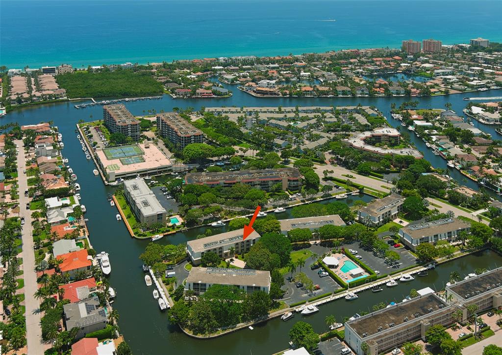 773 Jeffery Street, Unit 4305 Boca Raton, FL 33487 - Photo 2 of 22 an aerial view of residential building and lake